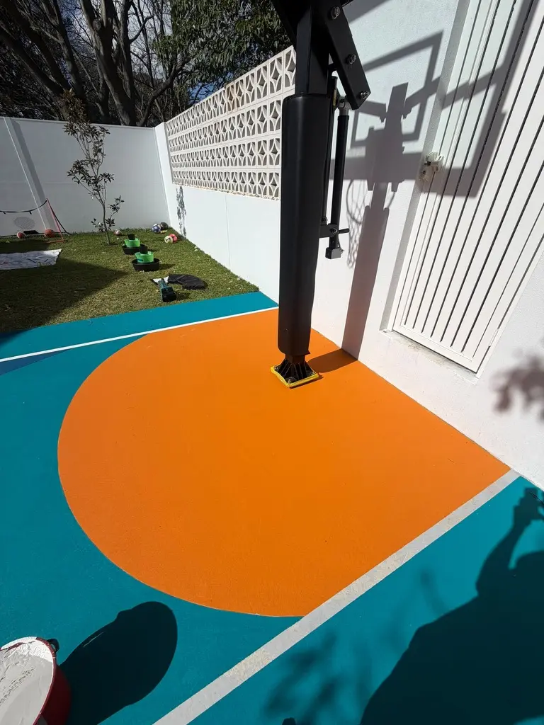 Custom five-colour backyard court — Basketball court resurfacing by Speedy Resurfacing