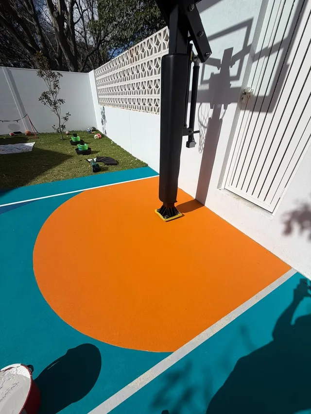 Custom five-colour backyard court — Basketball court resurfacing by Speedy Resurfacing