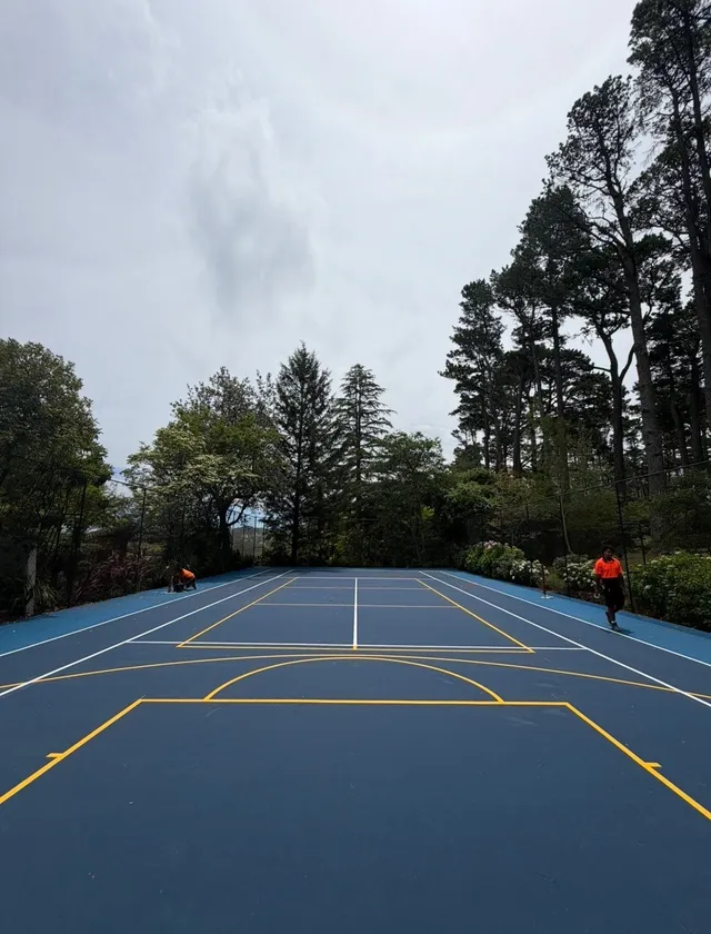 Two-tone backyard pickleball court — Pickleball court resurfacing by Speedy Resurfacing